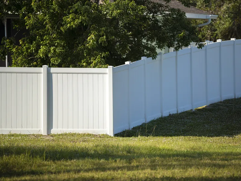 White plastic fence for back yard