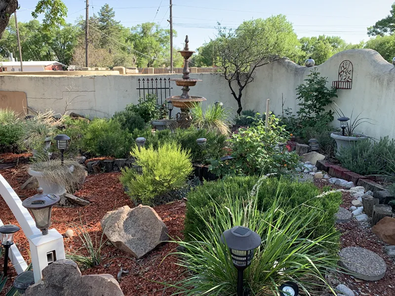xeriscaping landscape services showcasing lush greenery and decorative features